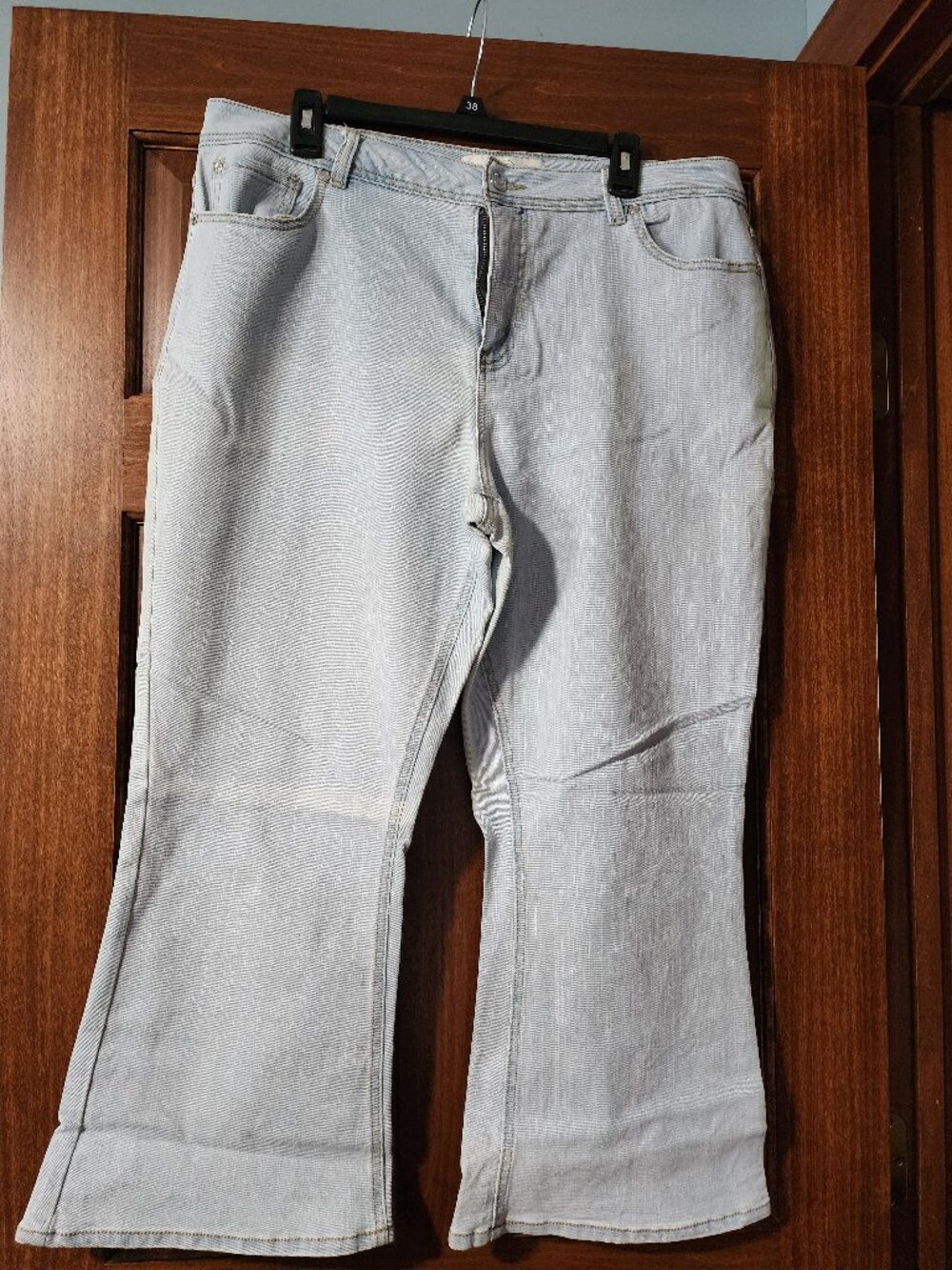 Cato light-wash, high-rise flare or wide-leg jeans